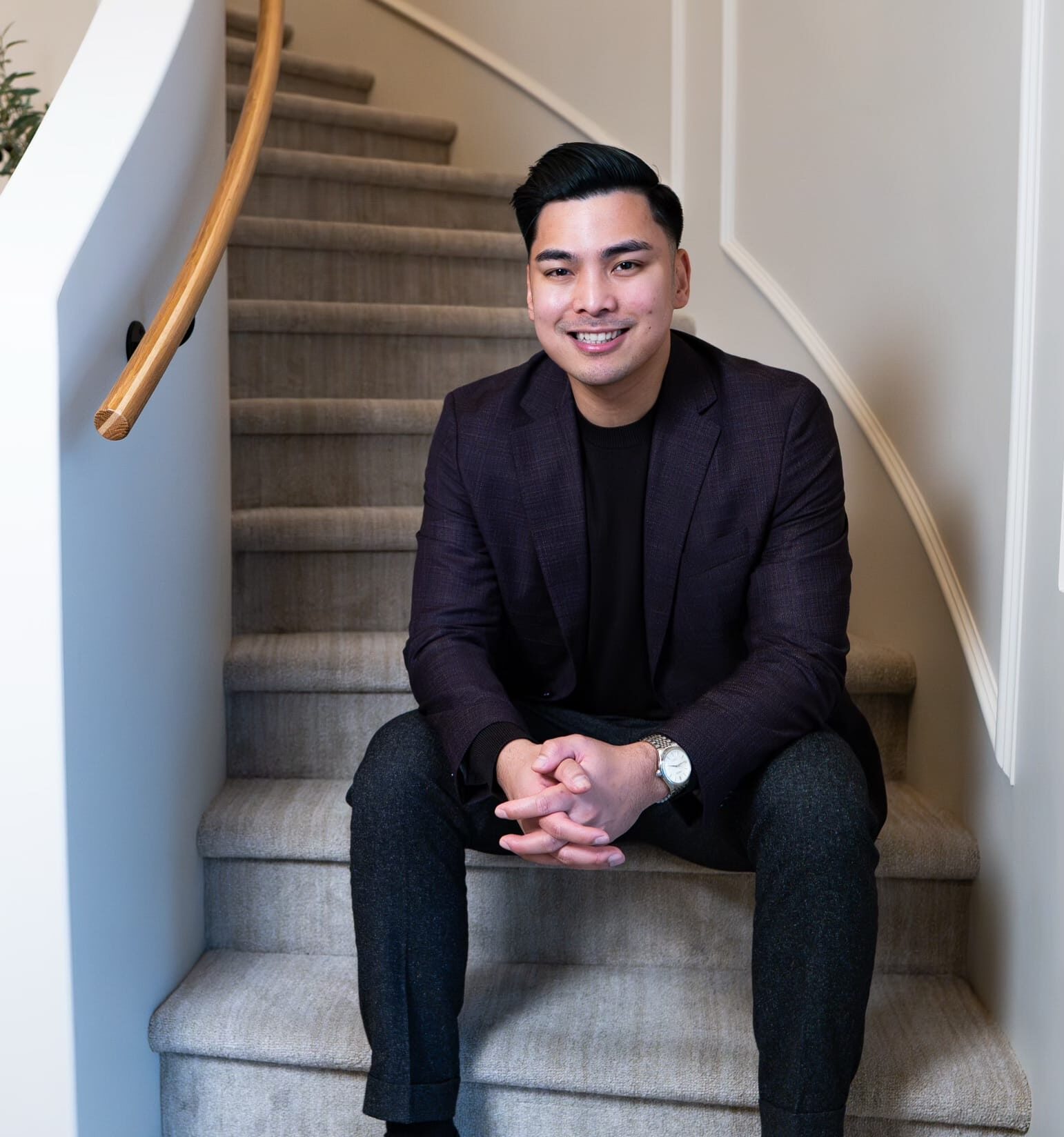 Mikee Headshot Stairs e1770582906354